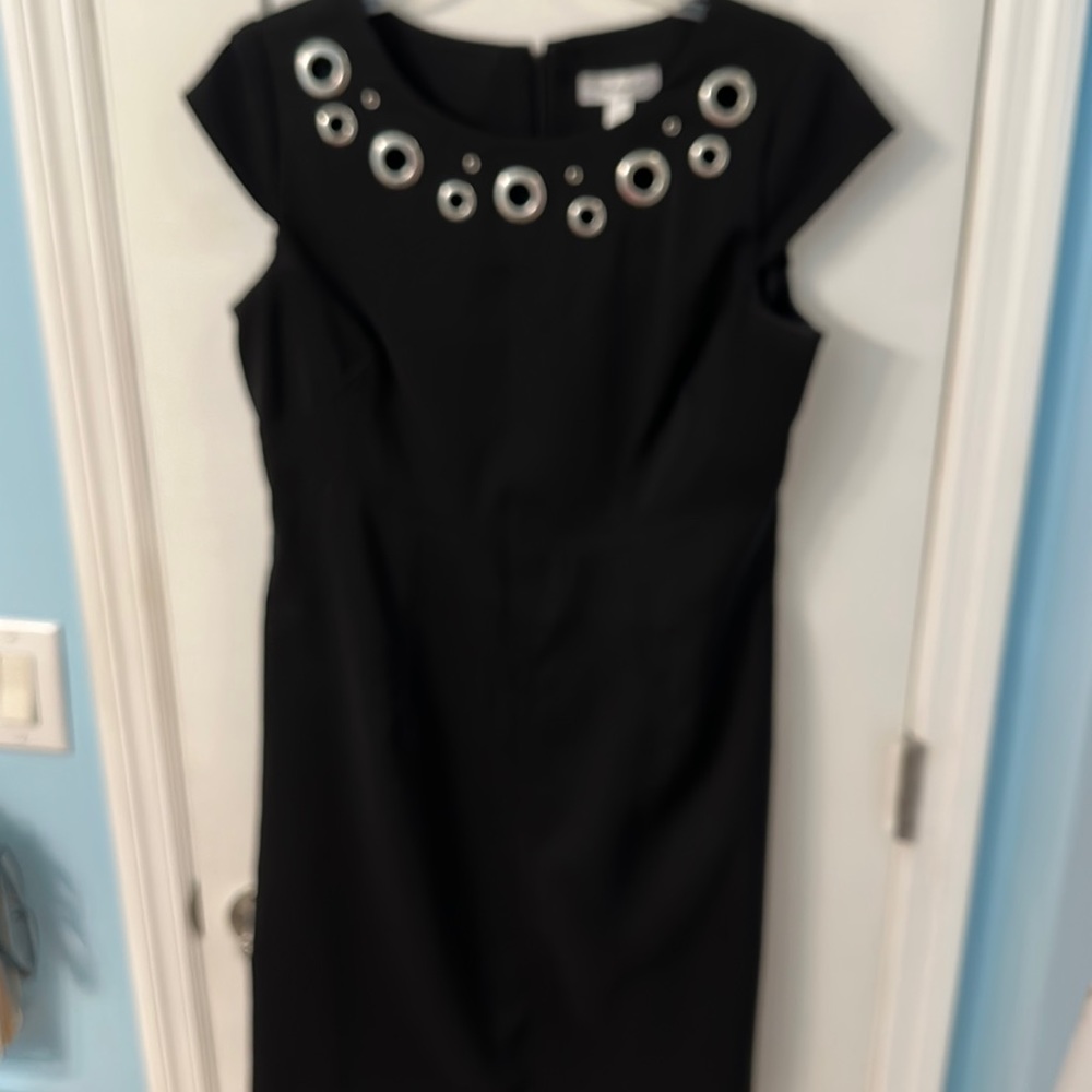 Dress barn black dress with silver circle design at top